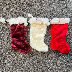 Set of Three Plush Christmas Stockings